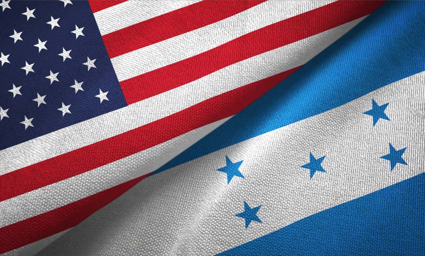 Bandera de Estados Unidos y de Honduras. Hay 13 consulados de Honduras en Estados Unidos donde pedir una cita para pasaporte hondureño en estados unidos o una cita para pasaporte hondureño en Estados Unidos.