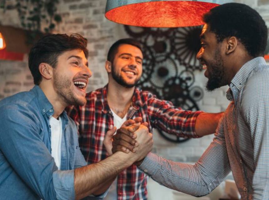 a group of men shaking hands