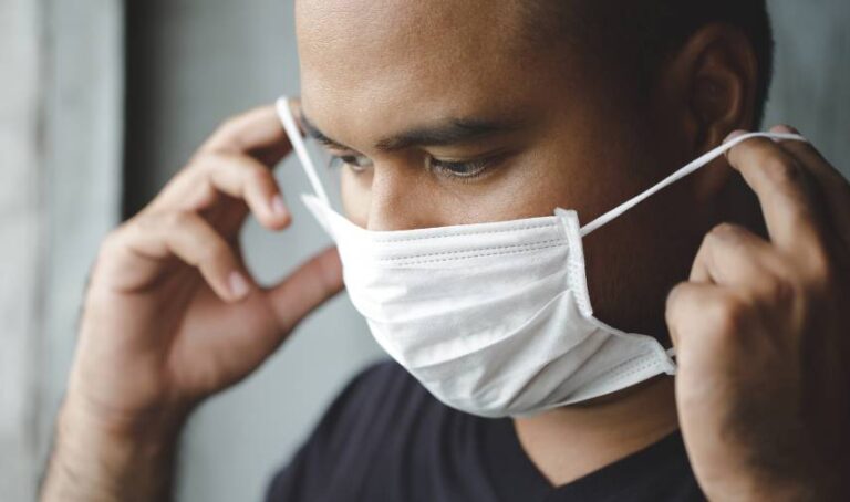 a man wearing a face mask