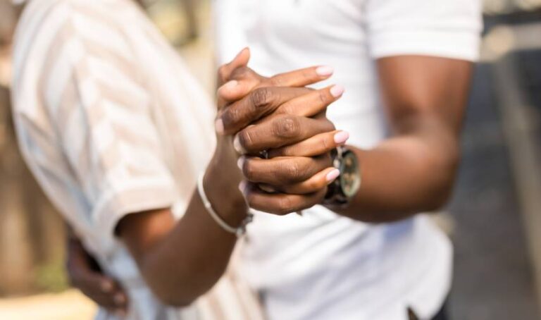 a close-up of a couple of hands