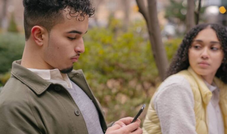 a man looking at a phone